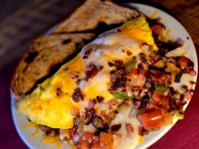 🍳✨ A Clifton Mill Classic Worth Talking About Again! ✨🍳

With all the excitement around the Legendary Lights of Clifton Mill, we haven’t shared as much from our restaurant lately — so let us reintroduce one of our customer favorites, The Garbage Omelet 😋

Packed with every meat and veggie we offer, loaded with cheese, and topped with our homemade sausage gravy, this hearty breakfast has been winning hearts (and filling plates) for years.

If you know, you know. 😉
If you don’t… it might be time for a visit!

https://cliftonmill.com/restaurant/